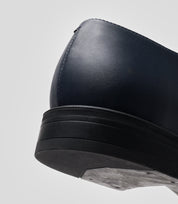 Sole detail of Vegan Oxford - Man shoe featuring a smooth leather upper and sturdy construction.
