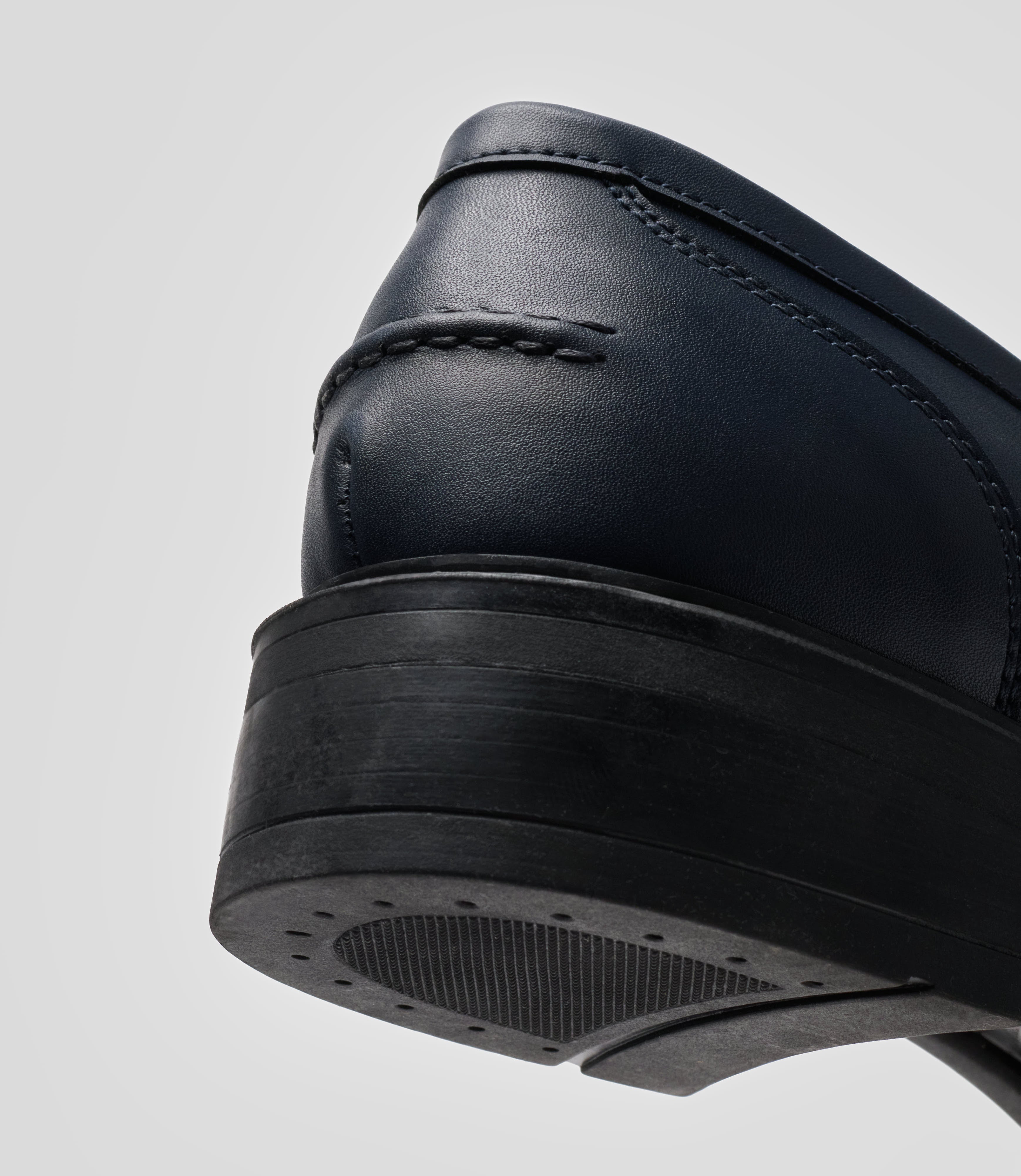 Close-up of the heel of Vegan Loafer - Woman showcasing the blake construction and distinctive stitching.