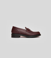 Vegan Loafer - Woman in burgundy color showcasing blake construction for stylish formal and casual wear.