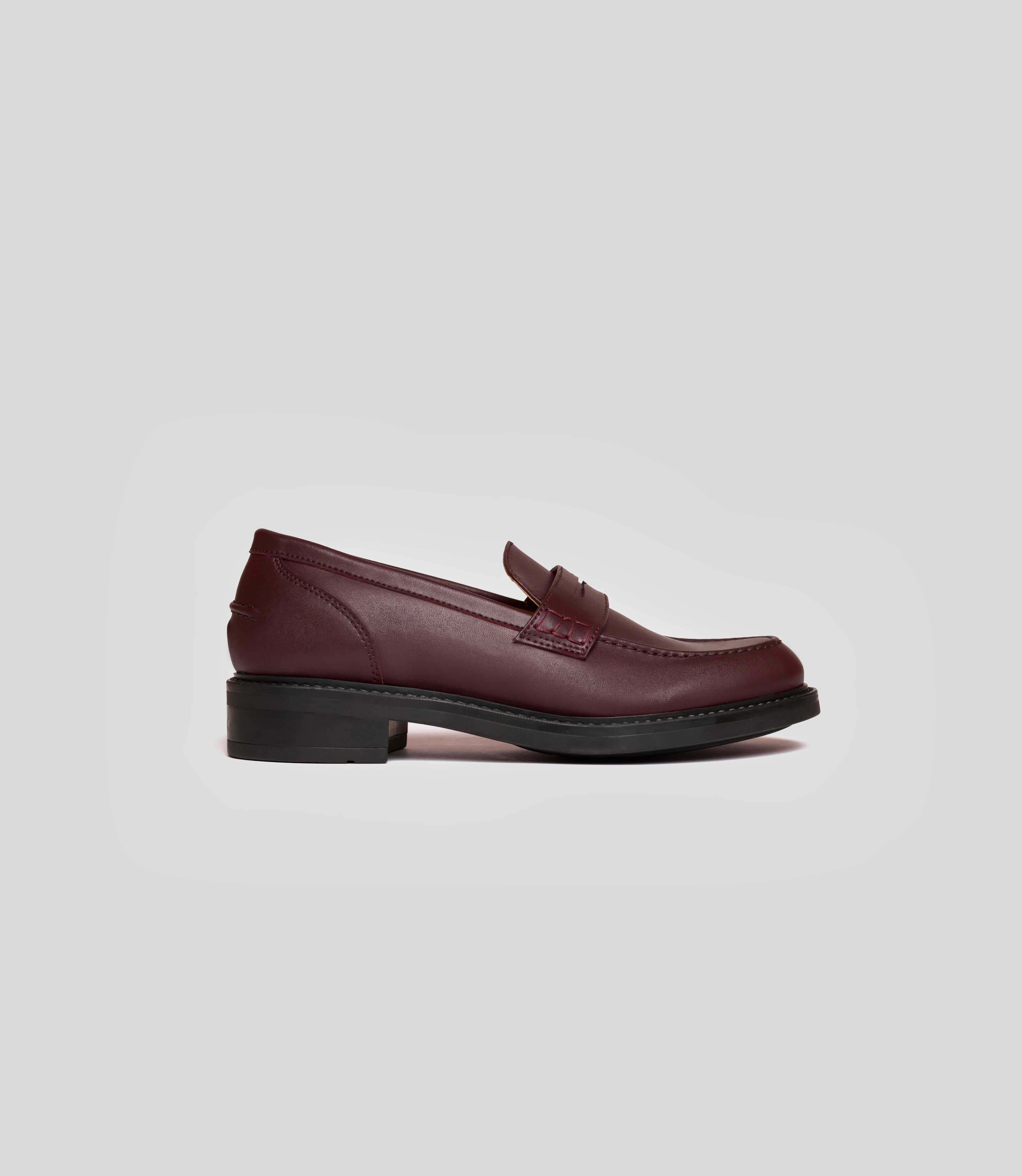 Vegan Loafer - Woman in burgundy color showcasing blake construction for stylish formal and casual wear.
