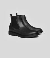 Vegan Chelsea Boot - Men, stylish black leather boots with elastic side panels for a sleek, elegant look.