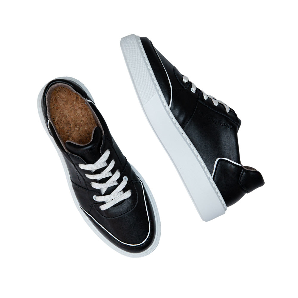 AGAZI EMI Low Black sneakers top view emphasizing laces and inner cork material. Sustainability Shoes. Environment friendly shoes.