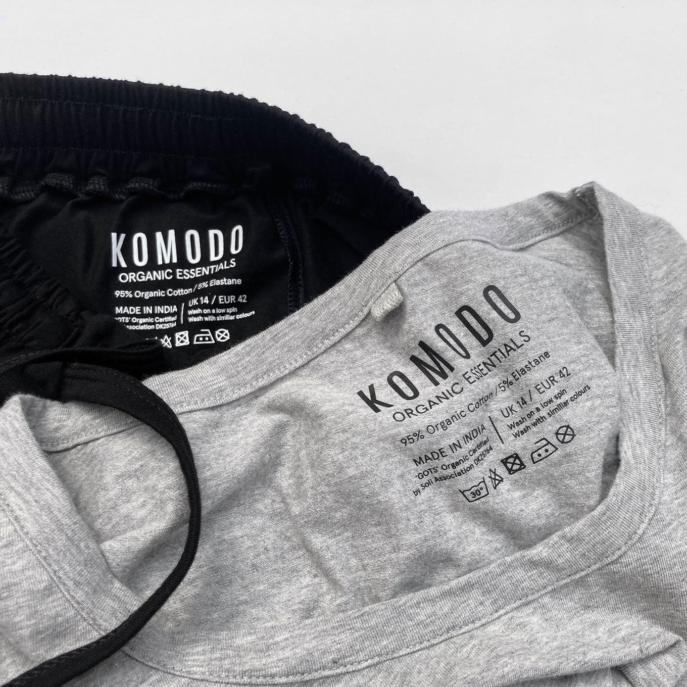 Flat lay organic cotton jersey basics for women. Organic and natural fibre, sustainable womens top's by KOMODO.