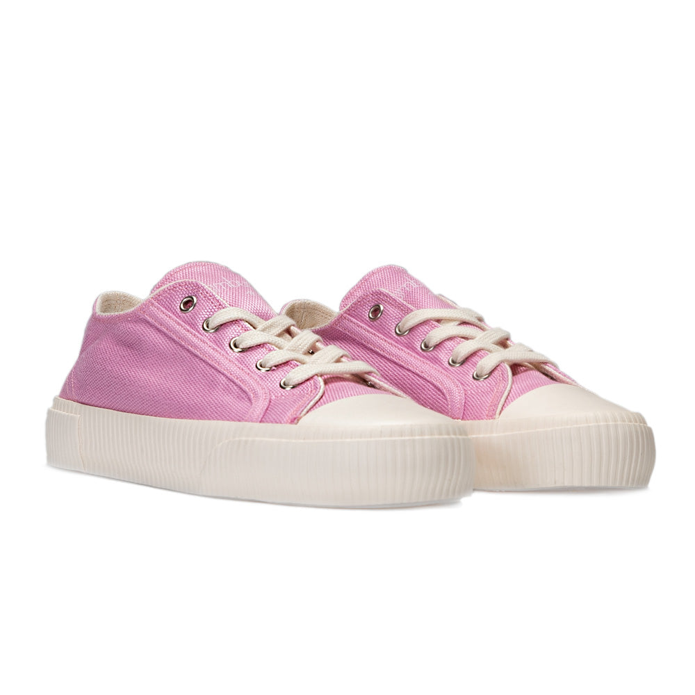 Front-angle view of a pair of pink Bamburista sneakers, highlighting the natural rubber sole and sustainable bamboo fiber upper.