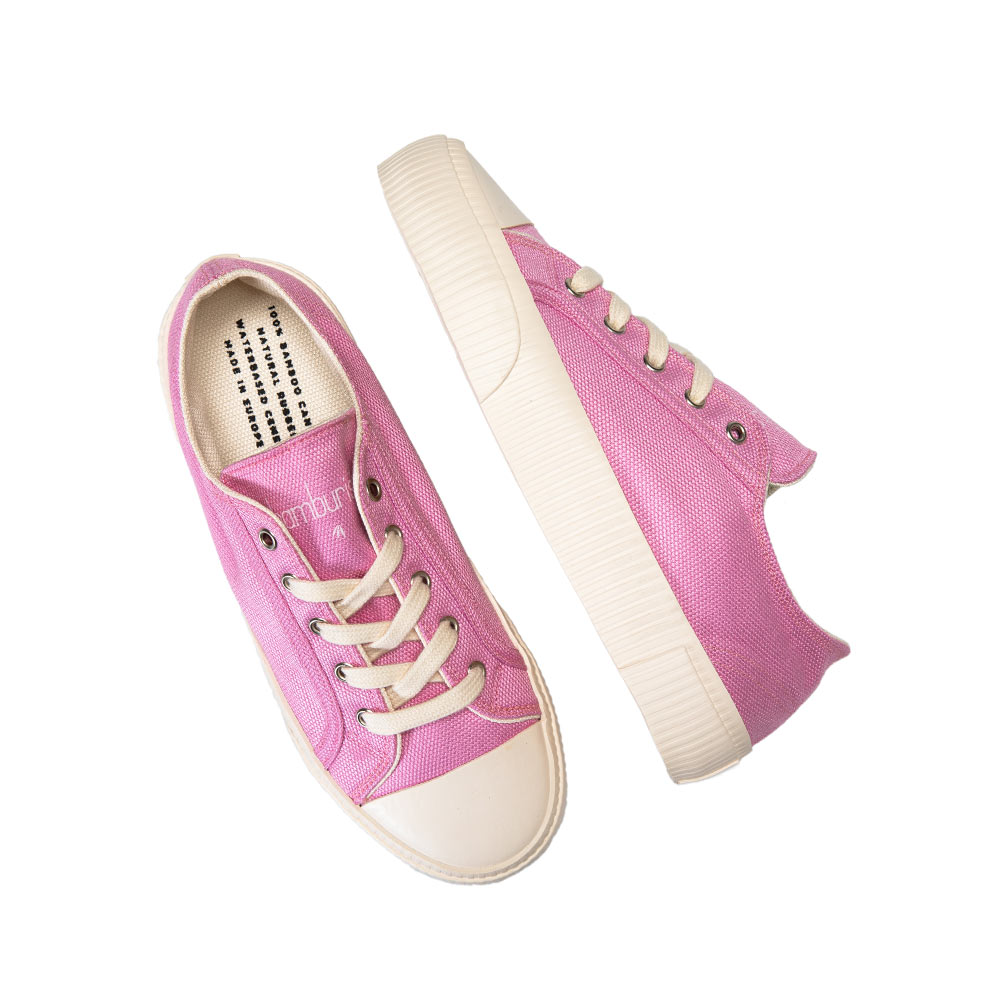 Top-down view of a pair of pink Bamburista sneakers laid flat, showcasing the bamboo textile material and sustainable design.