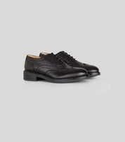 Vegan Oxford Brogue - Woman in black leather with broguing detail for elegant office and casual wear.