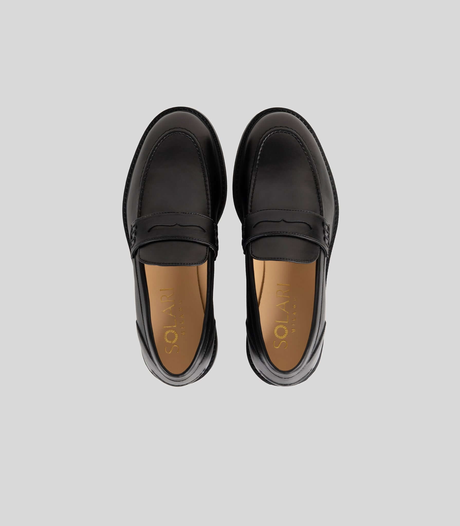 Vegan Loafer - Woman by Solari Milano, featuring a sleek black design and classic blake construction.