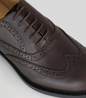 Close-up of Vegan Oxford Brogue - Woman featuring detailed broguing and lace-up design.