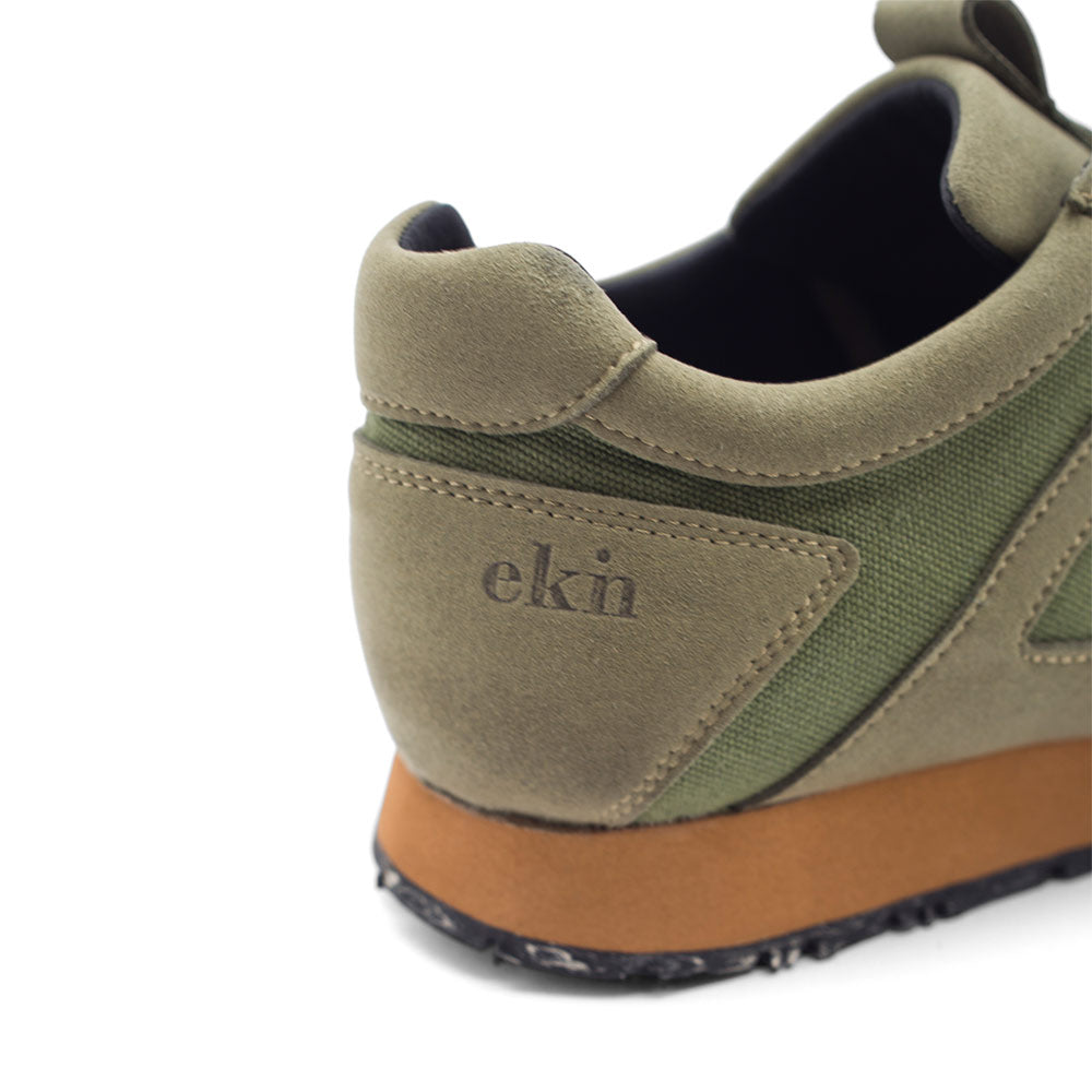 Back view of EKN Low Seed Runner Artichoke, a prime example of shoes sustainable design.