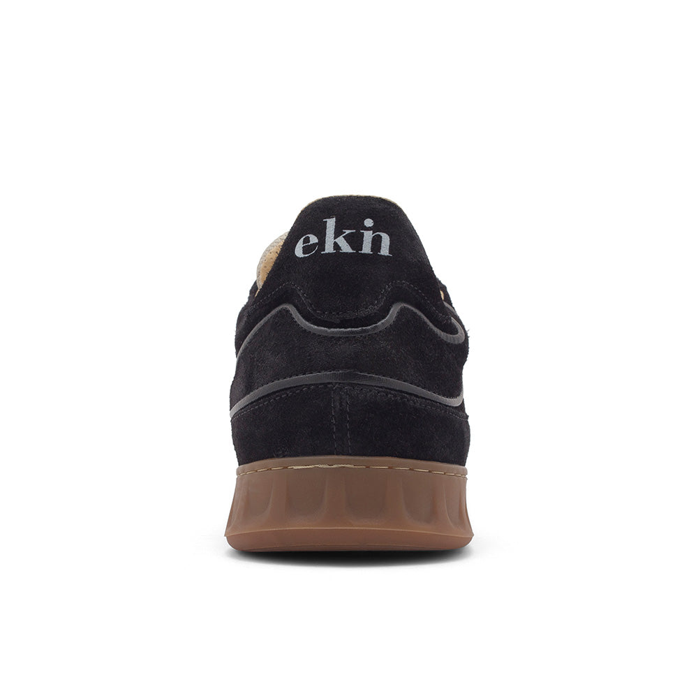 Rear view of EKN Alder Black sneakers with the EKN logo on the heel.