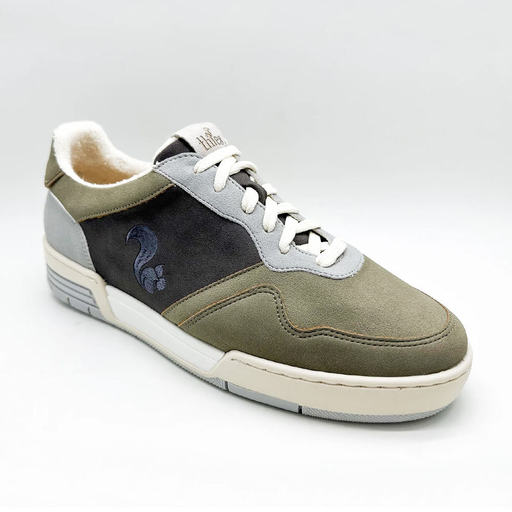 Angled view of Thies Eco Cup Charcoal shoes for men, displaying the sustainable and vegan design elements.