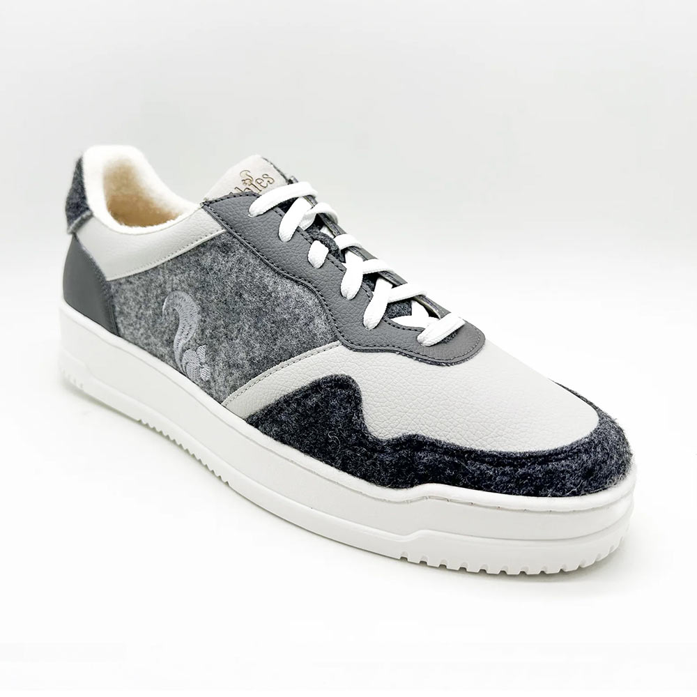 Angled view of Thies Eco Cup Fog shoes for men, displaying the sustainable and vegan design elements.