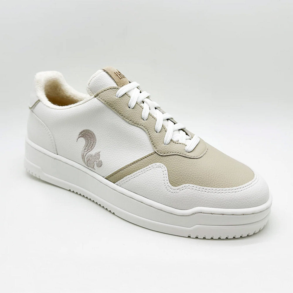 Front Side view of Thies Eco Cup White for women - sustainable vegan shoes, emphasizing the embroidered squirrel logo on the side.