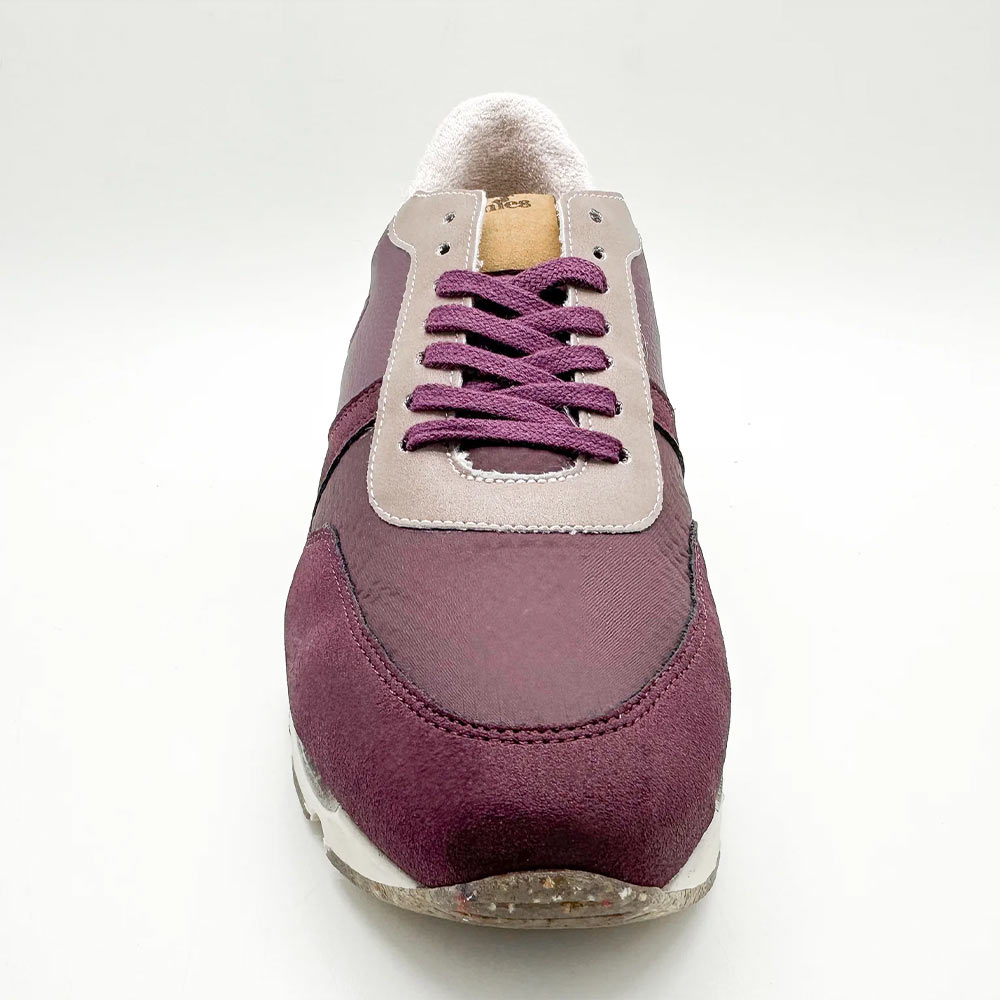 Top-down view of Eco Squirrel Runner Dark Berry for women - sustainable vegan shoes, focusing on the laces and tongue branding.