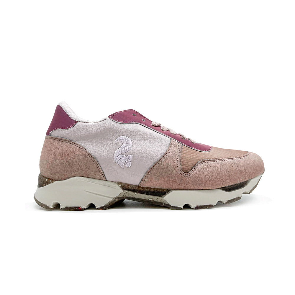 Side view of Thies Eco Squirrel Runner Rose for women - sustainable vegan shoes, showcasing the sneaker's stylish design with rose color accents and a squirrel logo on the side.