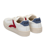 Rear view of a pair of Kumi Hygge 22 sneakers in blue and red, showcasing the Kumi branding on the heel tabs.