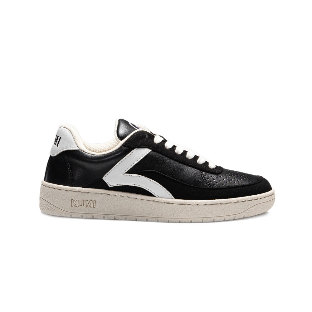 Side view of the Kumi black recycled material sneaker, featuring a black upper, white accents, and a rubber sole.