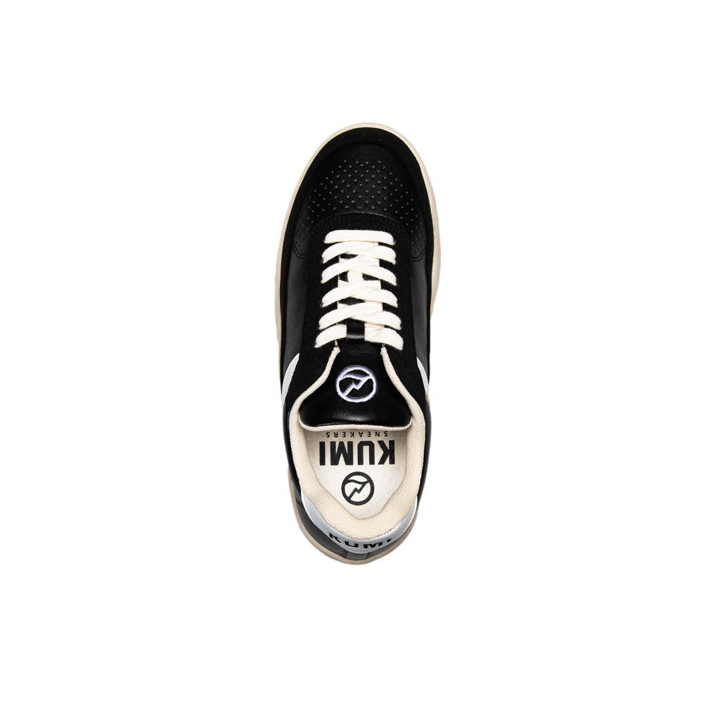 Top view of a Kumi black sneaker made from recycled materials, highlighting its perforated toe box, white laces, and 'Kumi' branding on the insole.