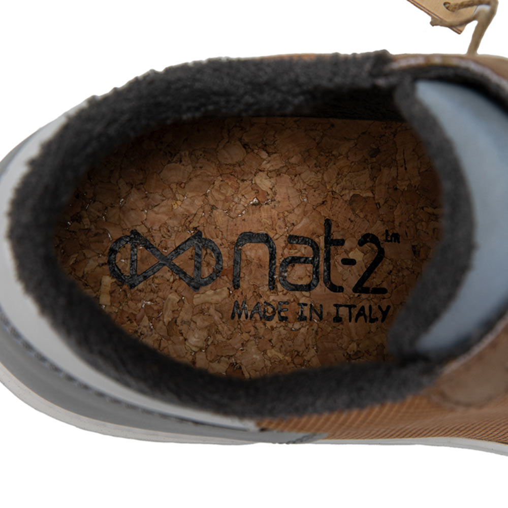 Nat-2 Wood Beige Sustainable shoe. Close-up of the inner sole showing the nat-2 branding and sustainable material.