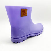 Rear angle of Thies Bio Rain Boots in lavender, highlighting the vegan boots' durable build.