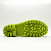 Sole view of Thies Bio Rain Boots in Lime green, emphasizing the vegan boots' tread pattern.