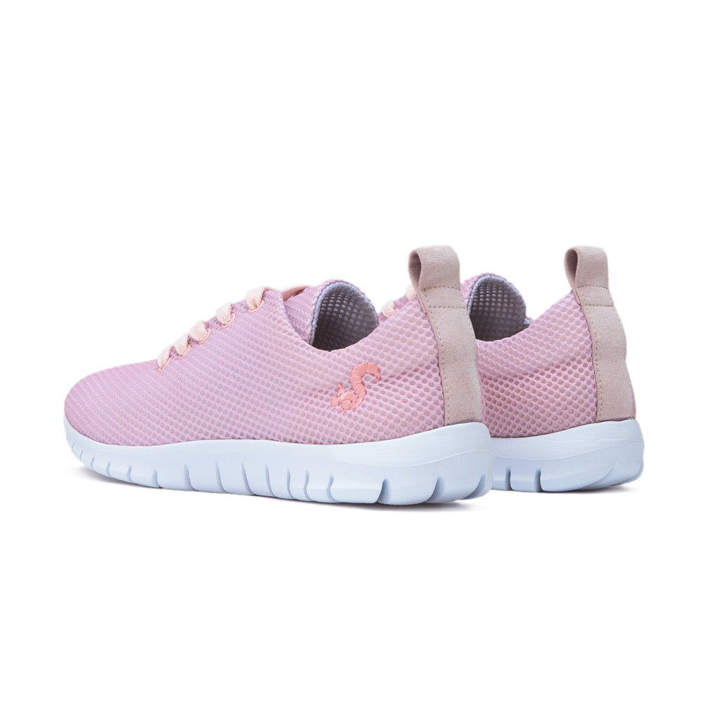 Back view of the pink Thies sustainable sneakers, showing the beige pull tab and heel details.