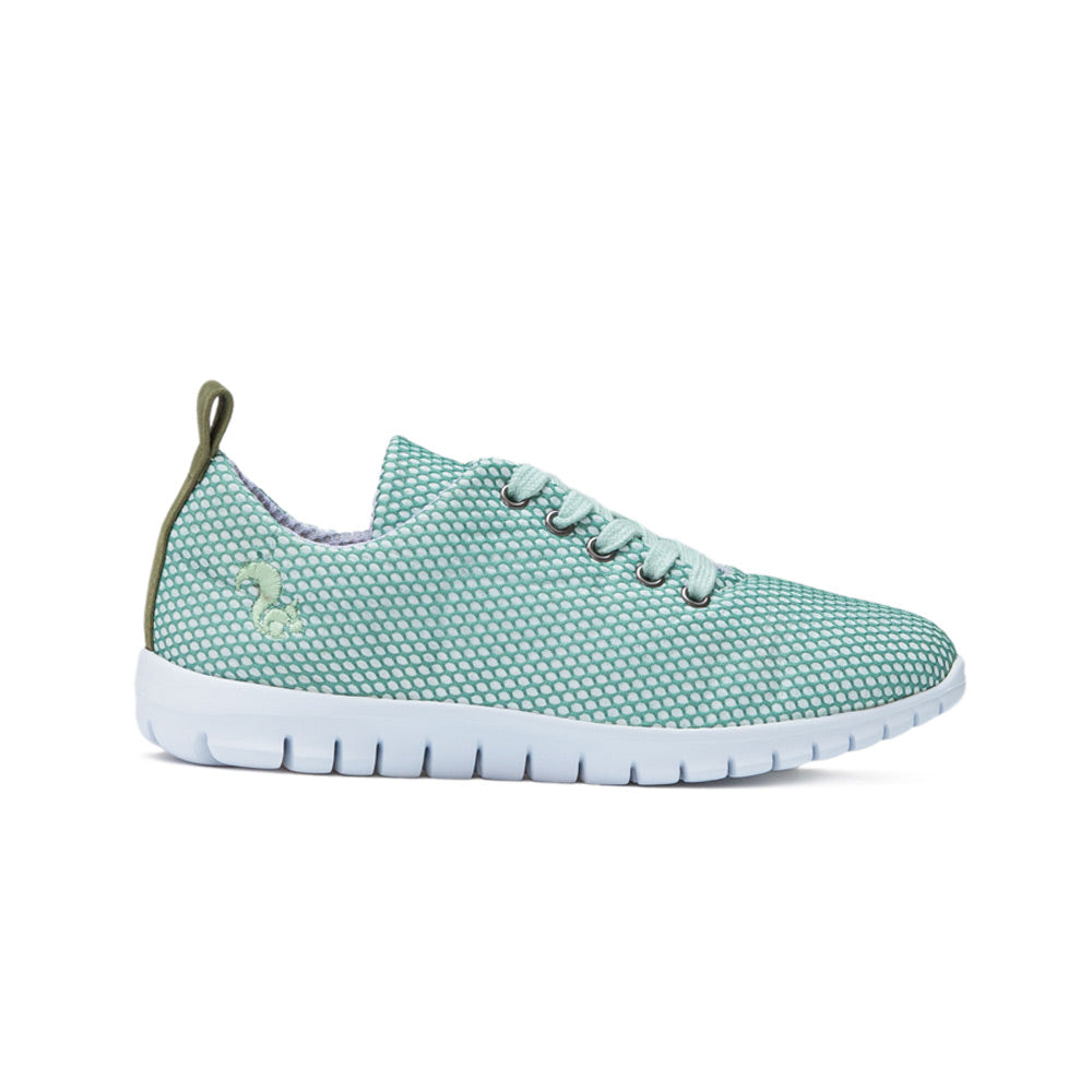 A clear side view showcasing the mesh texture and green shade of this sustainable shoe.