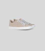 Vegan Hemp Sneaker V1 in beige color, showcasing lightweight hemp material and white laces, perfect for everyday wear.