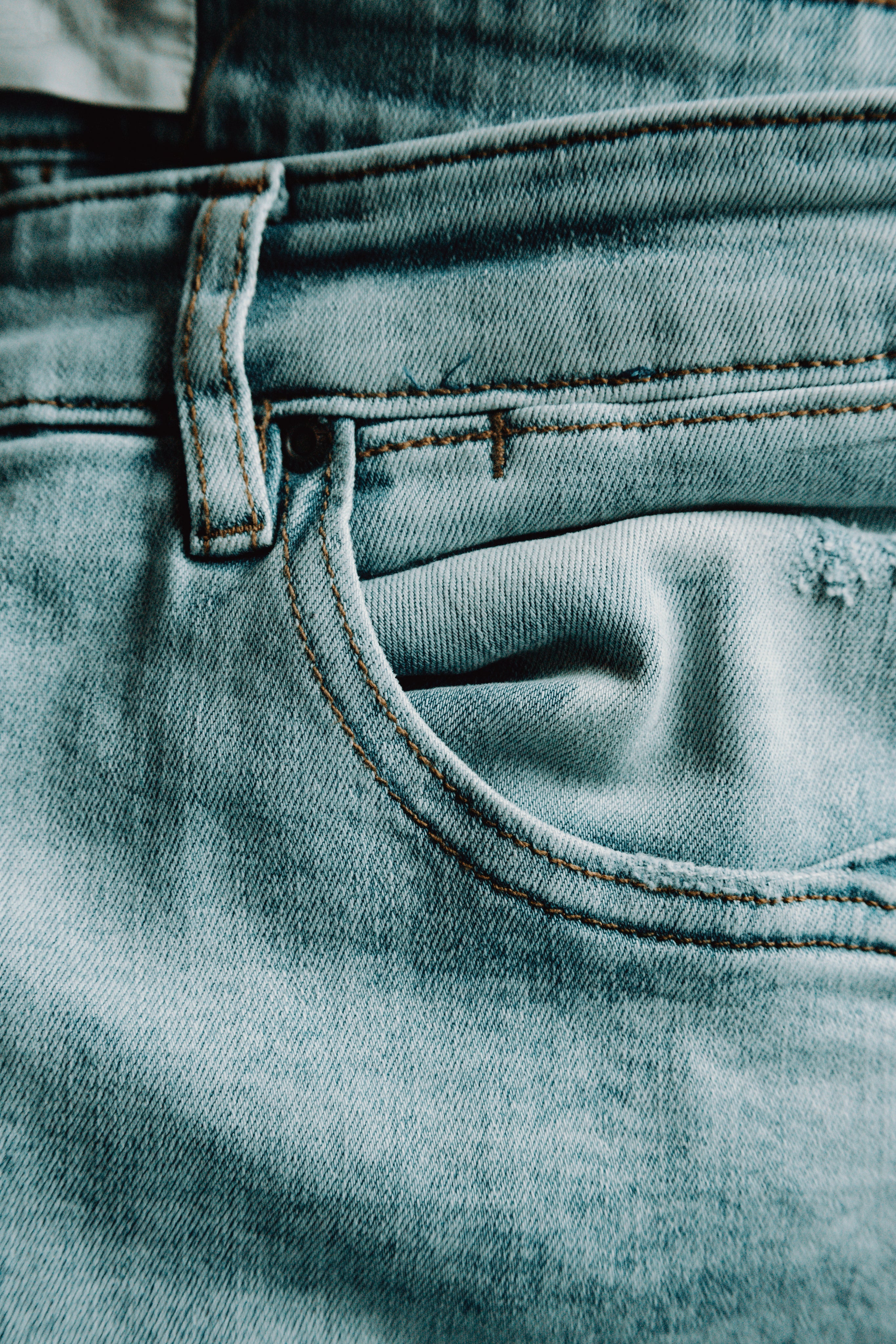 close-up-of-the-pocket-of-lite-blue-jeans.jpg